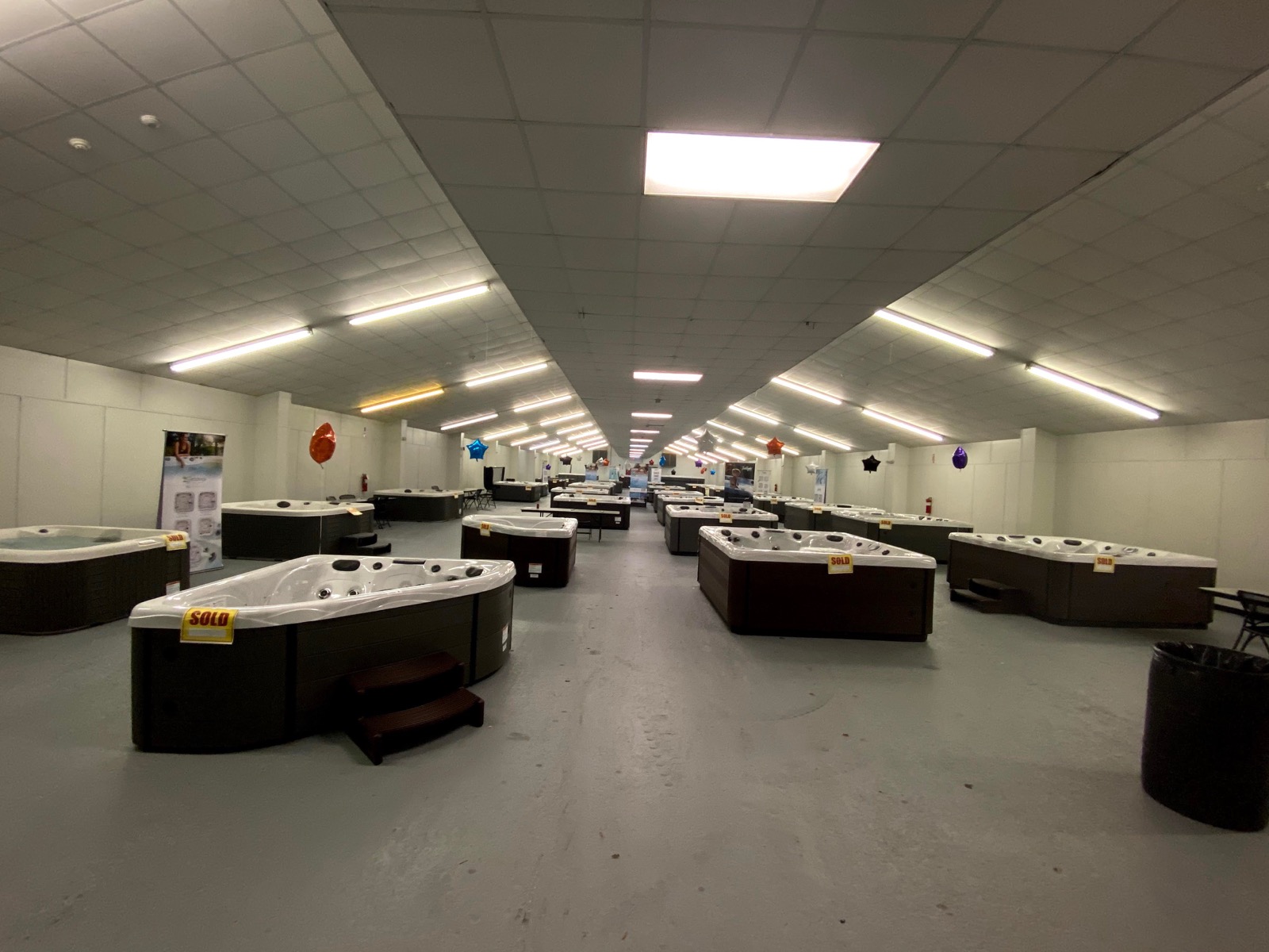 Hot tubs lined up on the expo floor